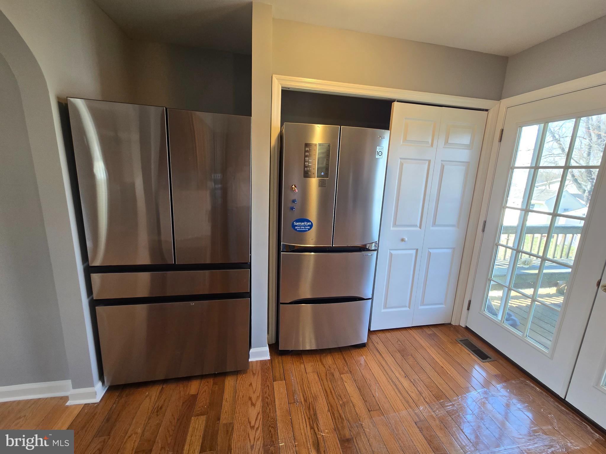11 Hockamick Road Cookstown, NJ 08511 - Photo 7 of 45 a kitchen with stainless steel appliances a refrigerator and wooden floor