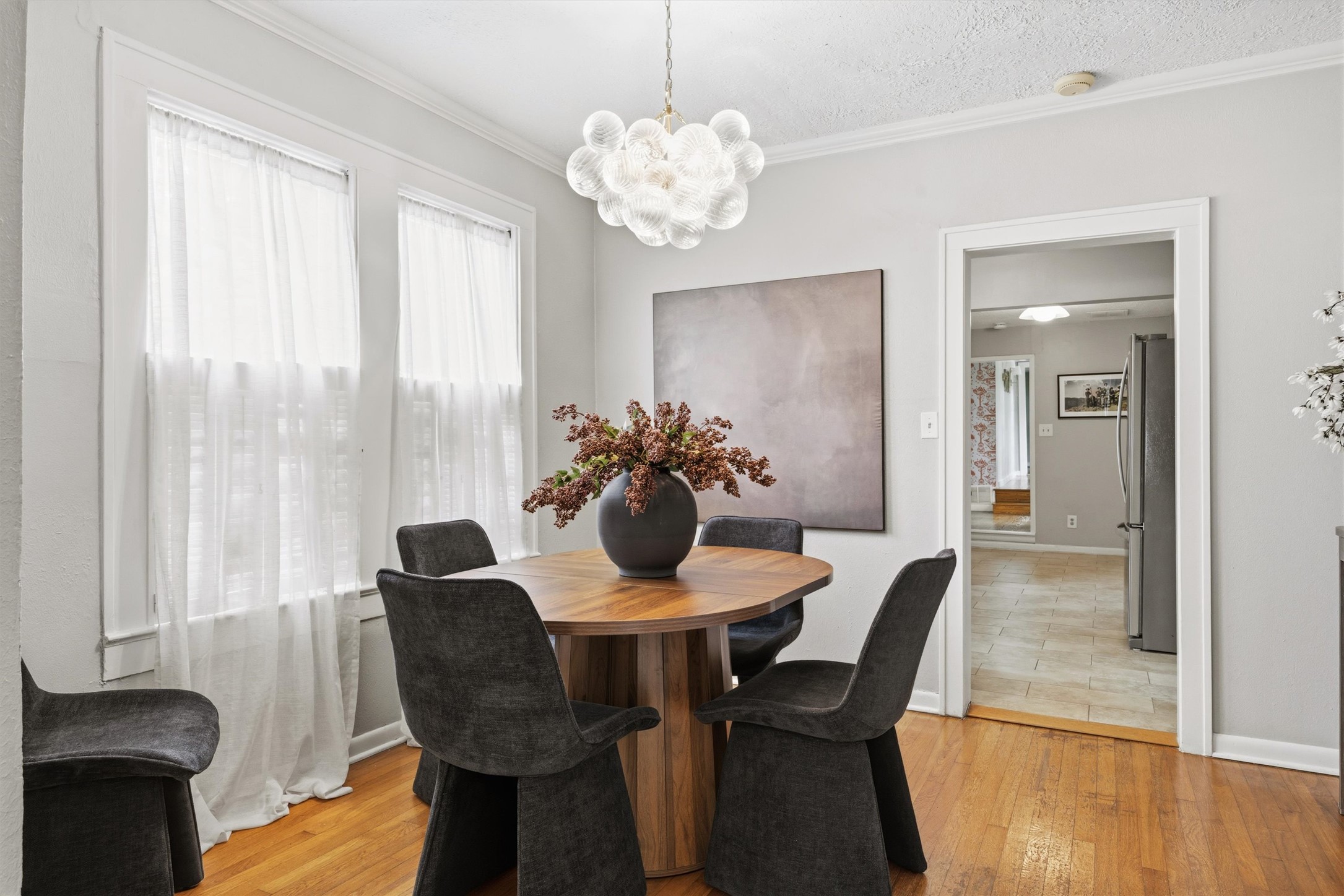 1507 Wethersfield Road Austin, TX 78703 - Photo 12 of 40 a dining room with furniture and wooden floor
