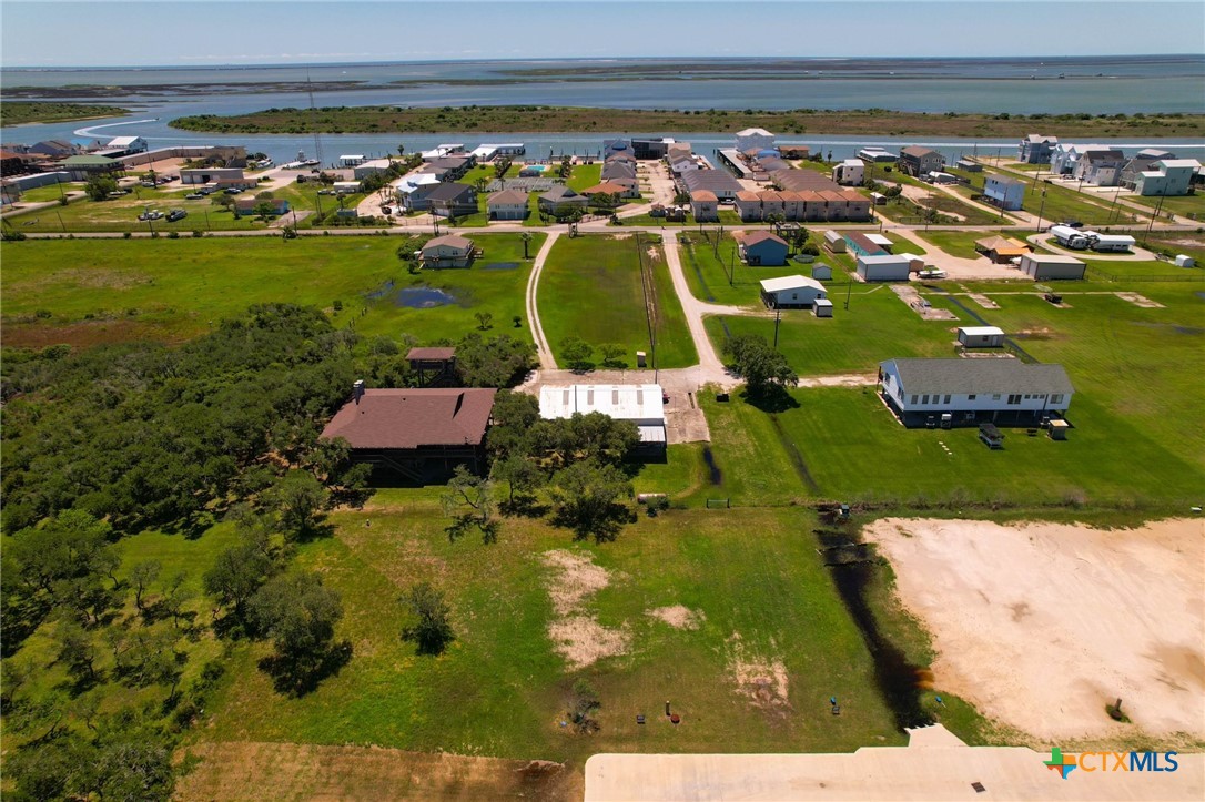 12-13 Circle Hook Port Port O'Connor, TX 77982 - Photo 13 of 22 an aerial view of residential houses with outdoor space