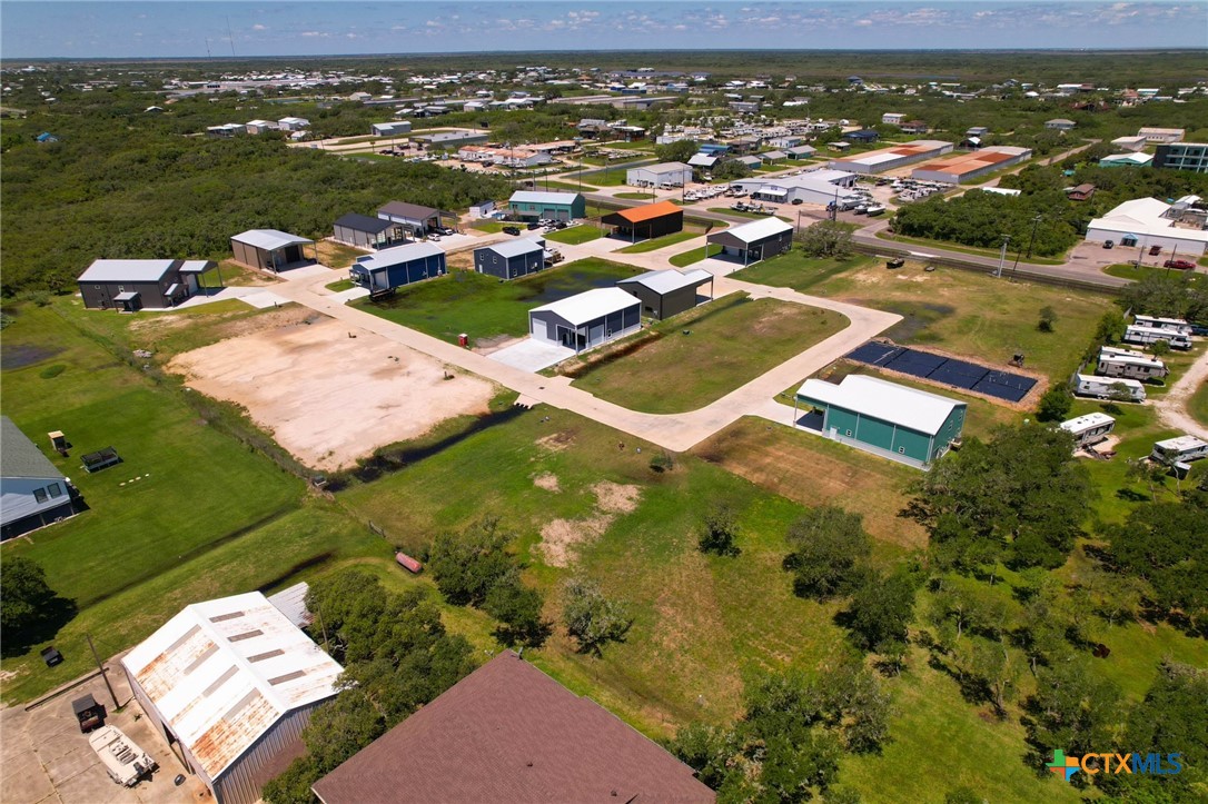12-13 Circle Hook Port Port O'Connor, TX 77982 - Photo 16 of 22 an aerial view of residential houses with outdoor space