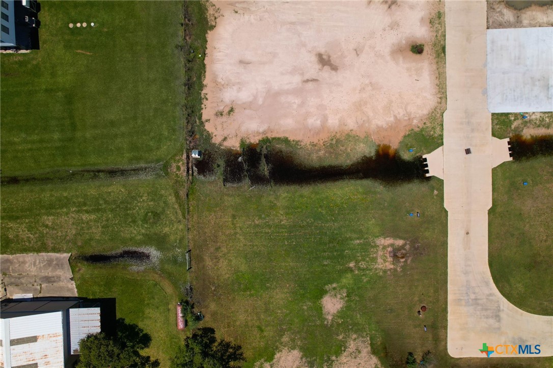 12-13 Circle Hook Port Port O'Connor, TX 77982 - Photo 18 of 22 an aerial view of residential houses with outdoor space