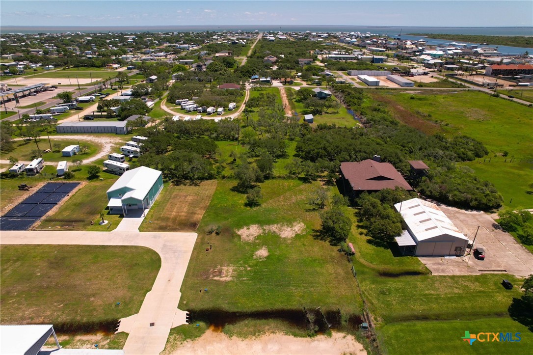 12-13 Circle Hook Port Port O'Connor, TX 77982 - Photo 20 of 22 an aerial view of residential houses with outdoor space