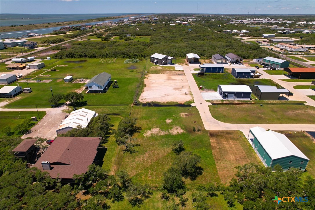 12-13 Circle Hook Port Port O'Connor, TX 77982 - Photo 22 of 22 an aerial view of a house with a lake view