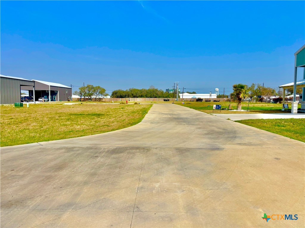 12-13 Circle Hook Port Port O'Connor, TX 77982 - Photo 6 of 22 a view of a swimming pool and an outdoor space