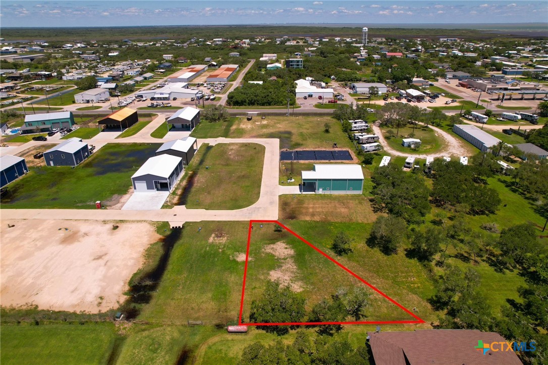 12-13 Circle Hook Port Port O'Connor, TX 77982 - Photo 8 of 22 an aerial view of residential houses with outdoor space