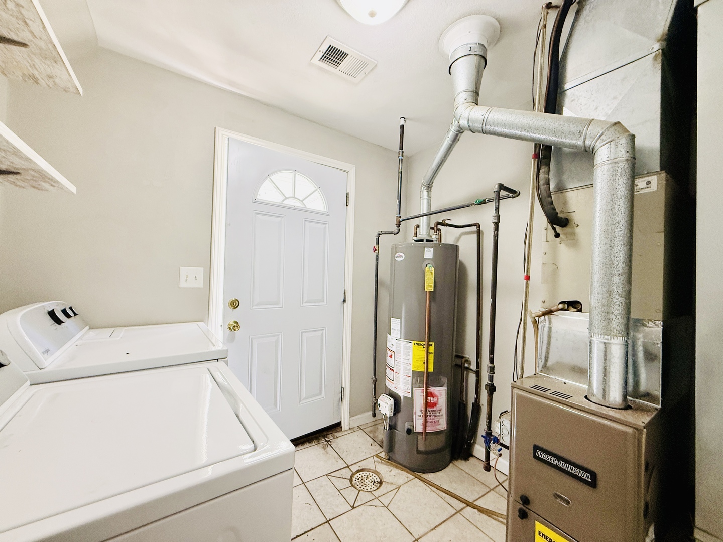 715 8th Street Colona, IL 61241 - Photo 12 of 14 a utility room with dryer and washer