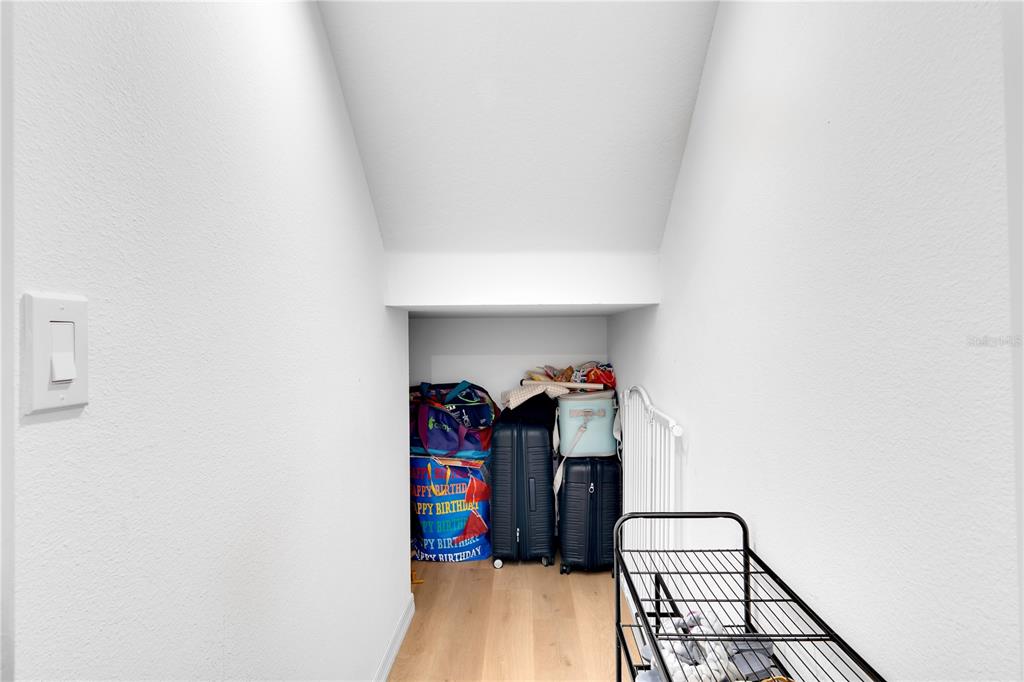 4226 Southern Vista Loop St. Cloud, FL 34772 - Photo 13 of 39 a view of walk in closet with clothes