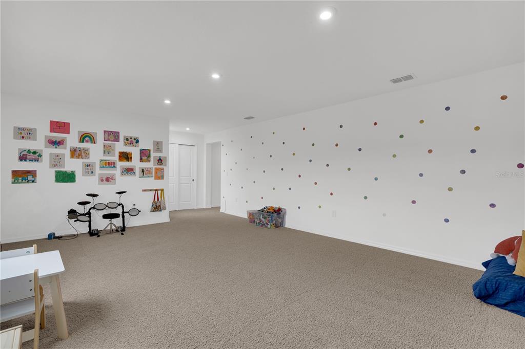 4226 Southern Vista Loop St. Cloud, FL 34772 - Photo 21 of 39 a view of a livingroom with toys