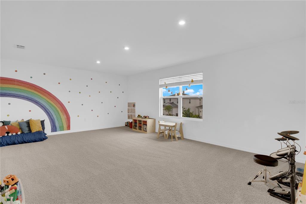 4226 Southern Vista Loop St. Cloud, FL 34772 - Photo 22 of 39 a view of a livingroom with furniture and a window