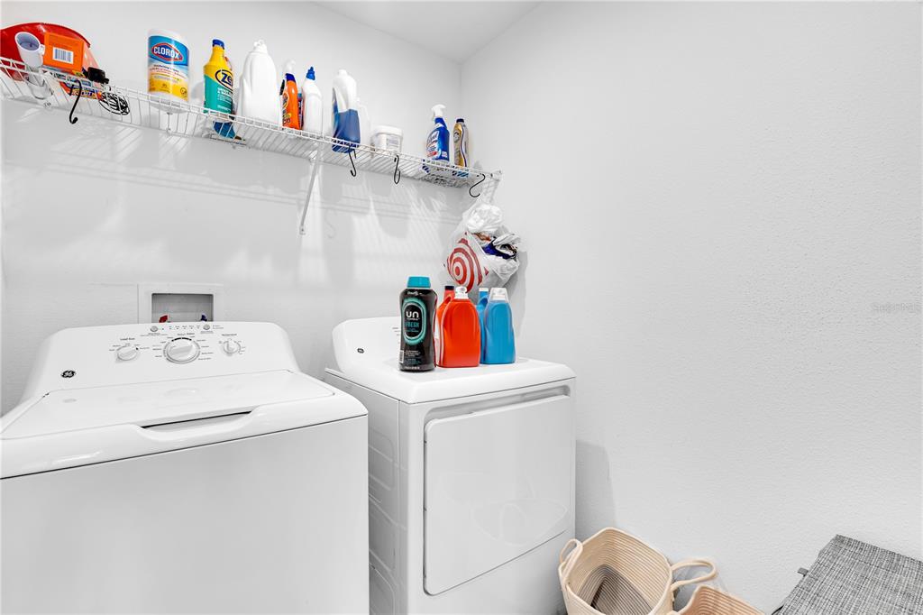 4226 Southern Vista Loop St. Cloud, FL 34772 - Photo 25 of 39 a utility room with dryer and washer