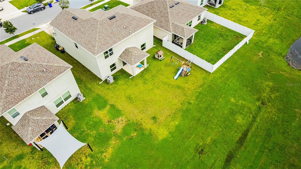 4226 Southern Vista Loop St. Cloud, FL 34772 - Photo 33 of 39 an aerial view of residential house with pool