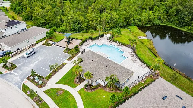 an aerial view of a house with a garden
