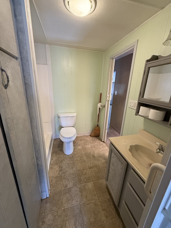 4 Center Street Brimfield, MA 01010 - Photo 11 of 16 a bathroom with a sink and a toilet