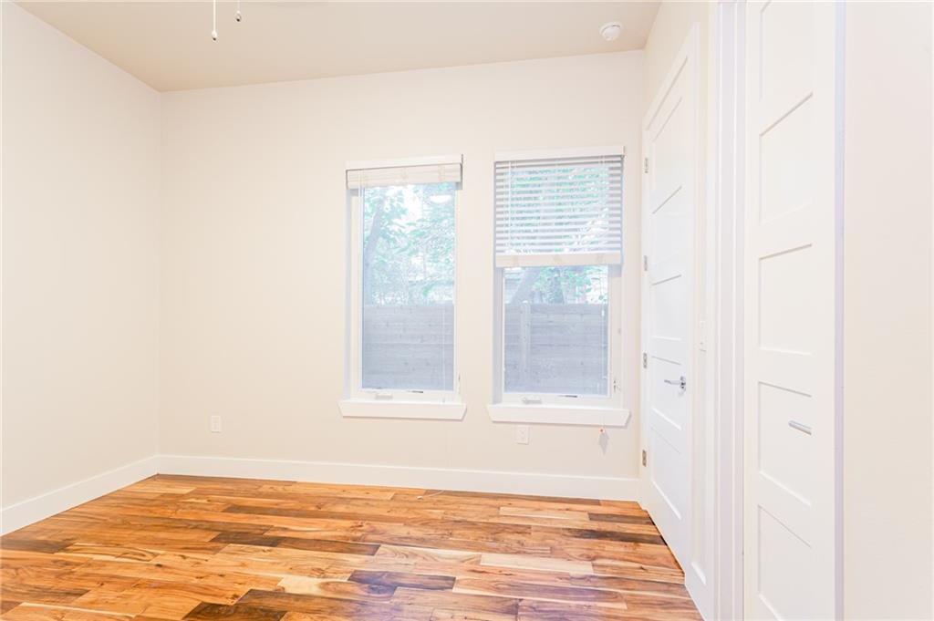 2509 Del Curto Road, Unit B Austin, TX 78704 - Photo 22 of 31 Spare room featuring light wood finished floors and baseboards