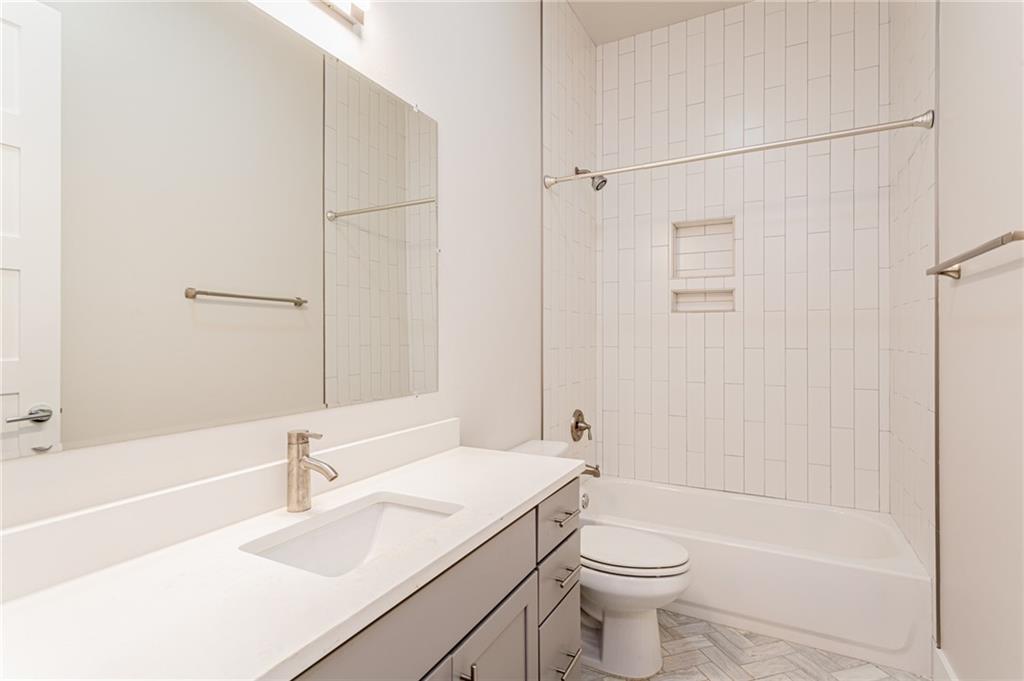 2509 Del Curto Road, Unit B Austin, TX 78704 - Photo 26 of 31 Full bath with vanity, toilet, and shower combination