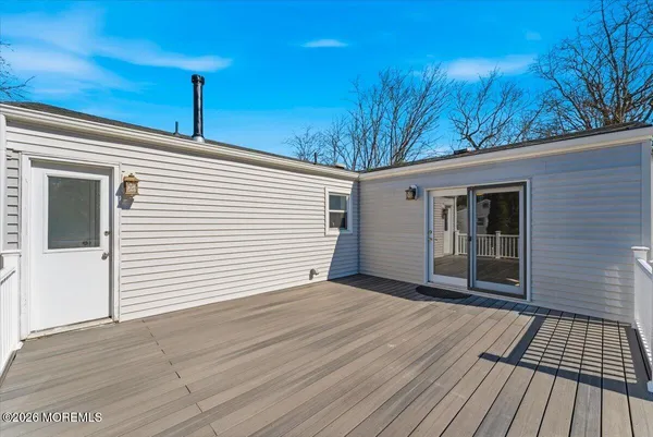 a view of a house with a roof deck