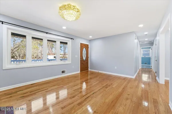 a view of kitchen with wooden floor