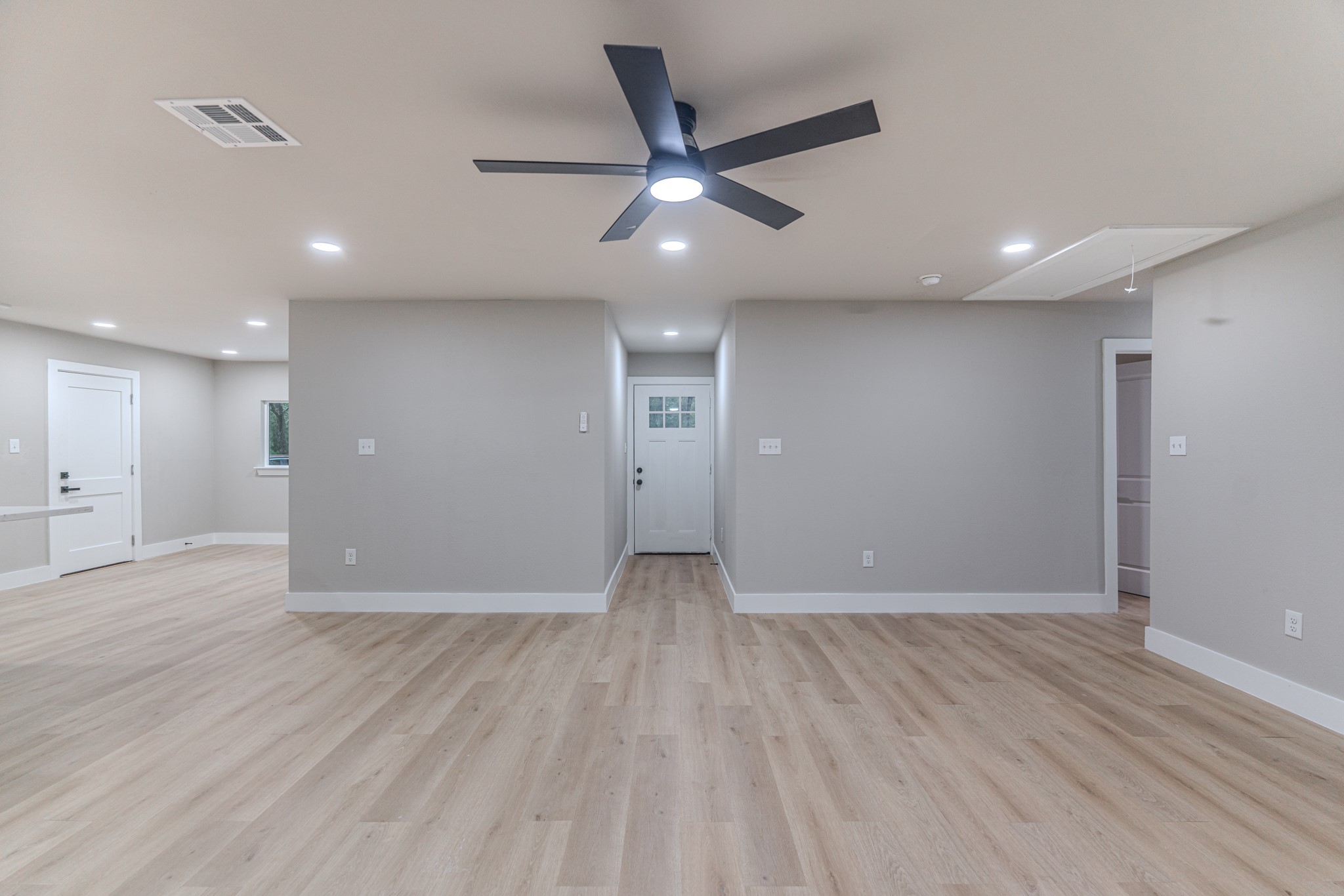 26701 Knottywood Oakhurst, TX 77359 - Photo 11 of 47 a view of an empty room and wooden floor