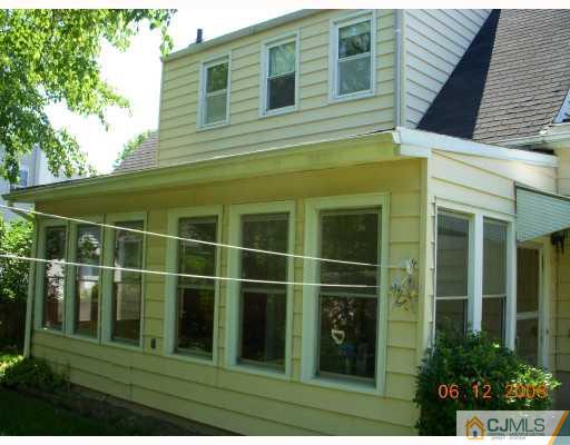 51 Helmetta Road Monroe Township, NJ 08831 - Photo 3 of 8 a view of a house with a window