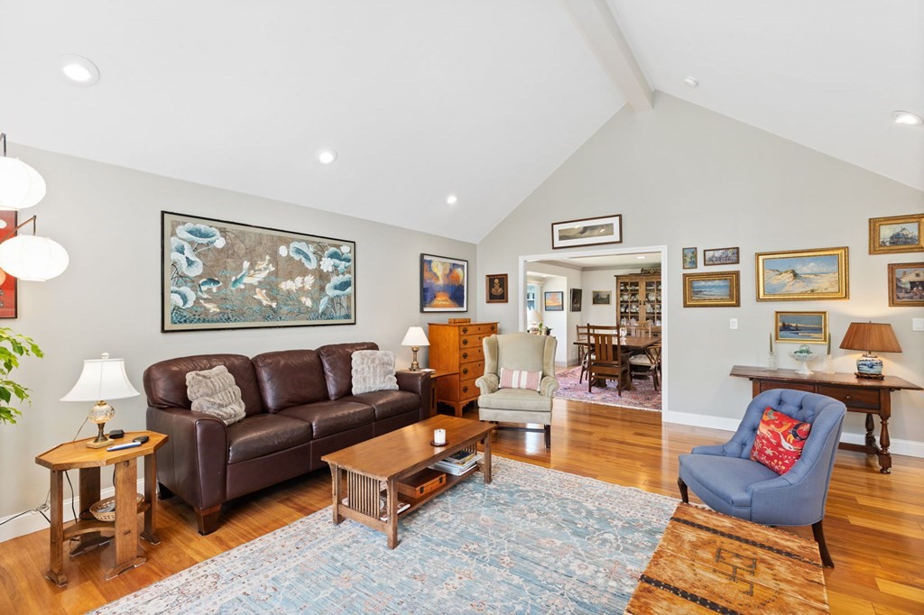 82 Thistle Patch Way, Unit 82 Hingham, MA 02043 - Photo 12 of 39 a living room with furniture and painting on the wall