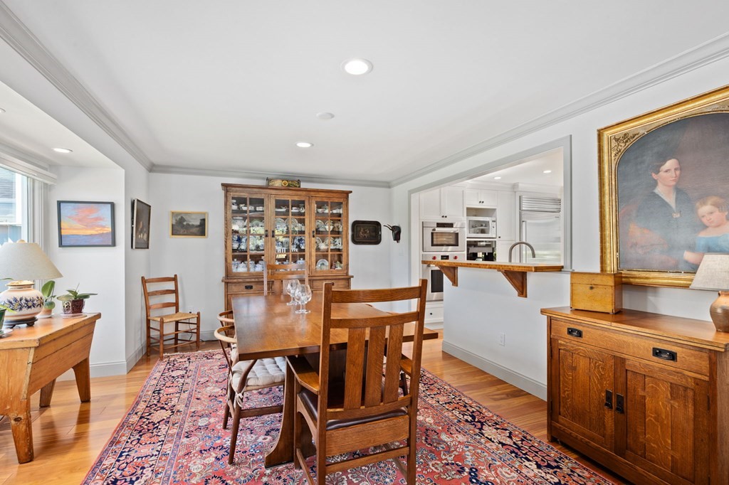 82 Thistle Patch Way, Unit 82 Hingham, MA 02043 - Photo 13 of 39 a living room with furniture and wooden floor