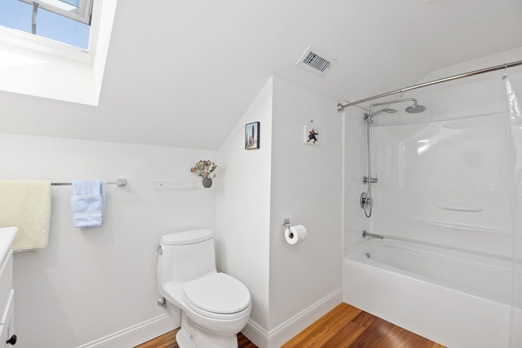 82 Thistle Patch Way, Unit 82 Hingham, MA 02043 - Photo 31 of 39 a bathroom with a toilet and a bathtub