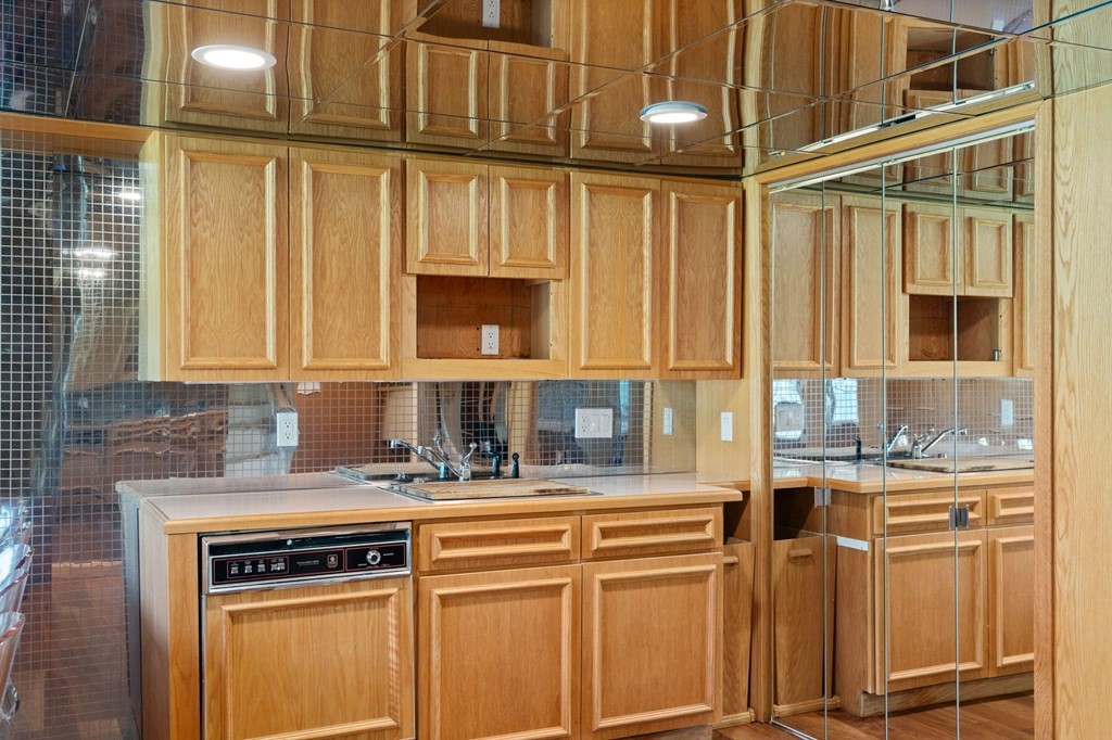 82 Thistle Patch Way, Unit 82 Hingham, MA 02043 - Photo 34 of 39 a kitchen with stainless steel appliances granite countertop a sink and cabinets