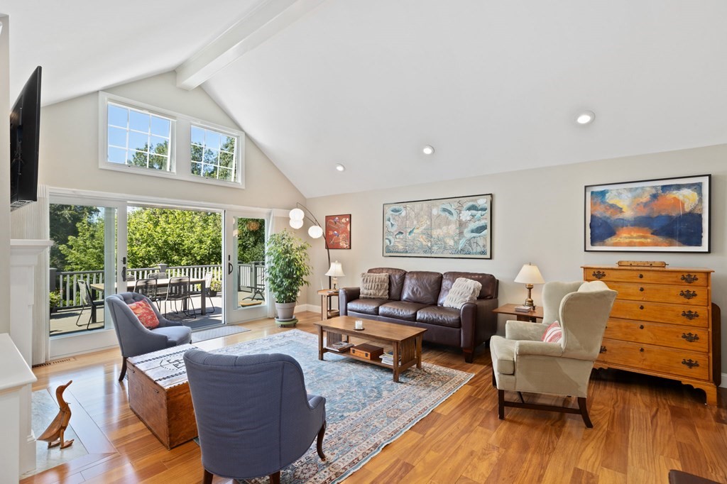 82 Thistle Patch Way, Unit 82 Hingham, MA 02043 - Photo 4 of 39 a living room with furniture and a large window