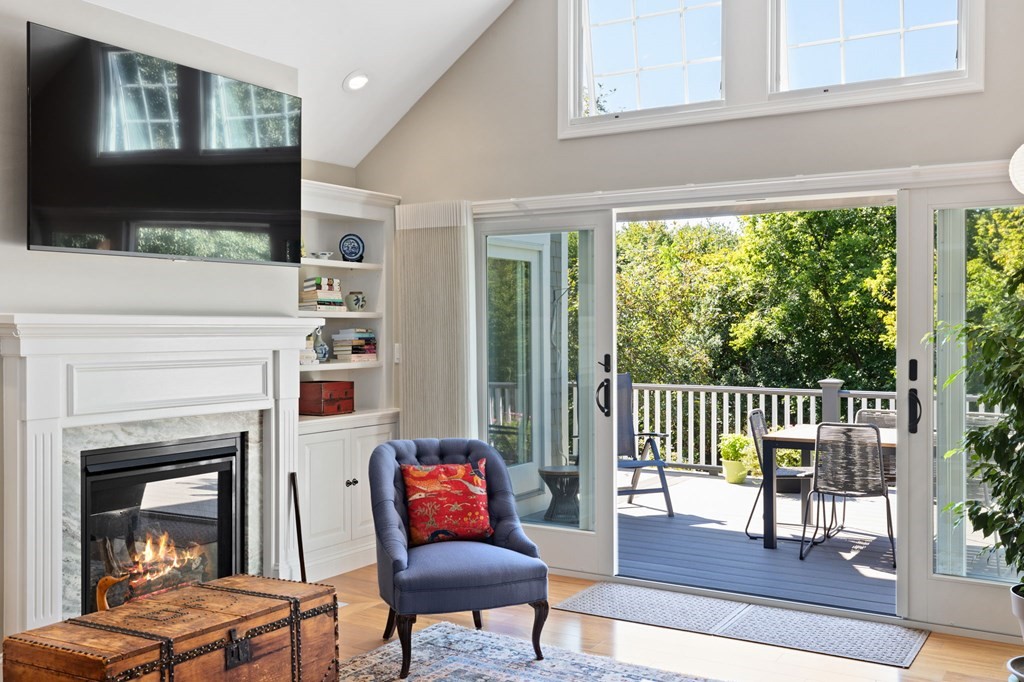82 Thistle Patch Way, Unit 82 Hingham, MA 02043 - Photo 5 of 39 a living room with furniture and a fireplace