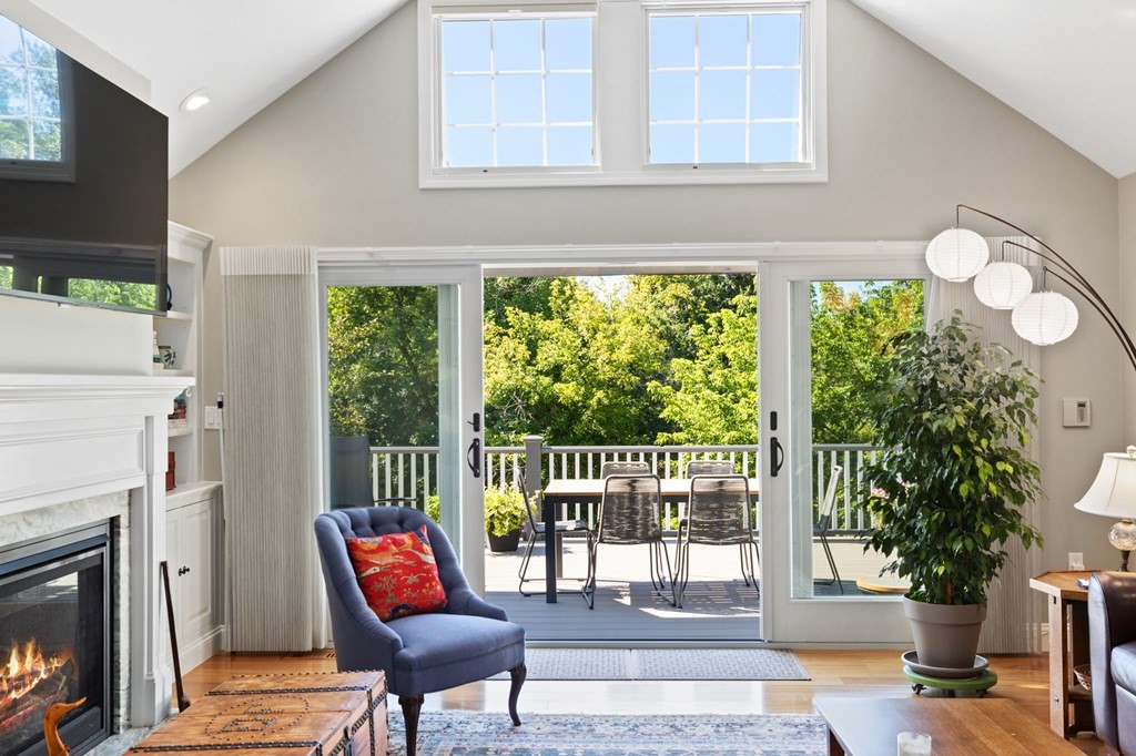 82 Thistle Patch Way, Unit 82 Hingham, MA 02043 - Photo 7 of 39 a view of a chairs and table in front of a house