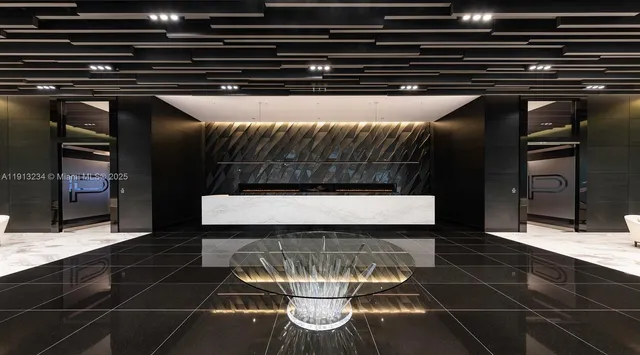 a bedroom with bed and a large mirror