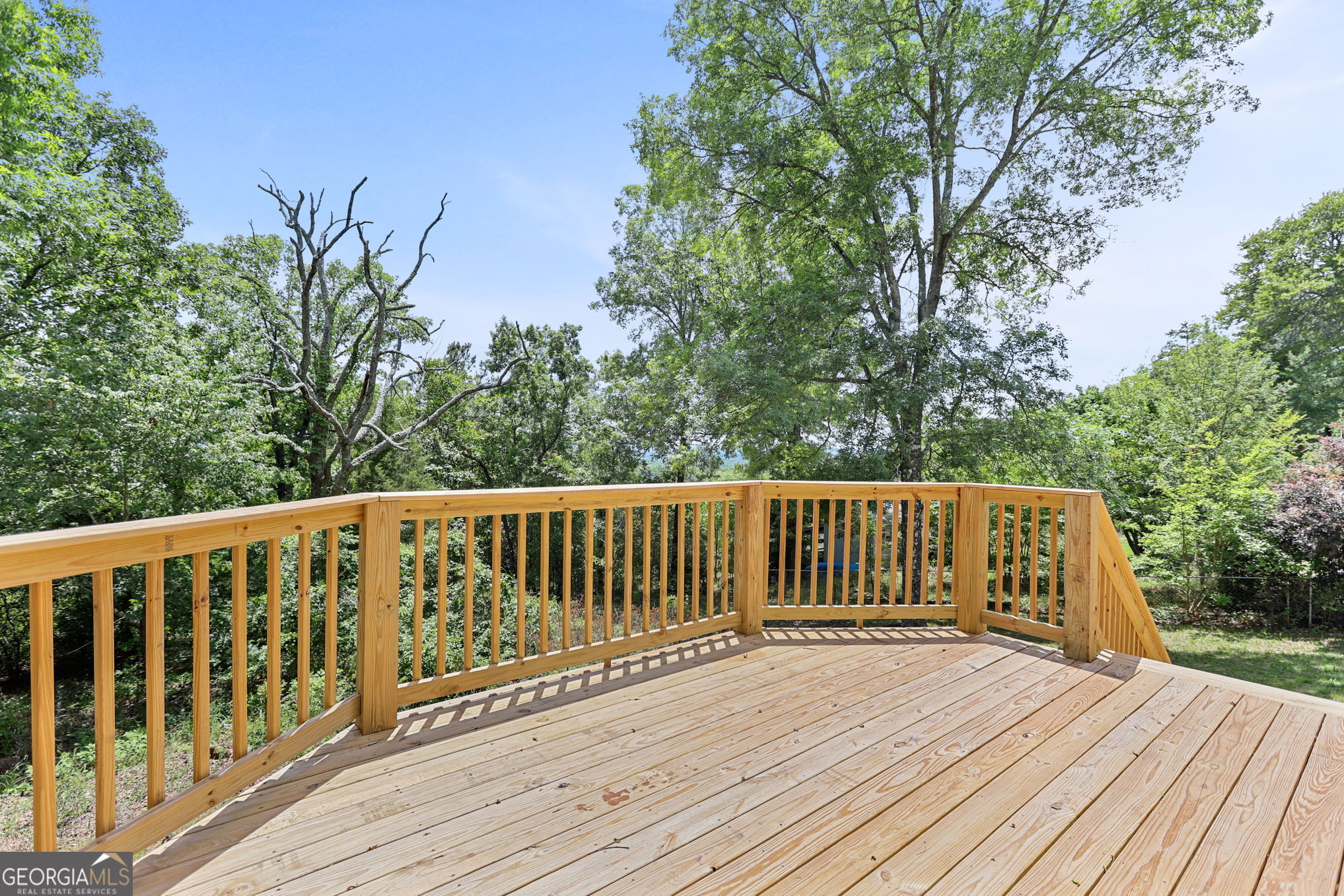 7060 Scenic Heights Road Manchester, GA 31816 - Photo 45 of 52 a balcony with wooden floor and fence