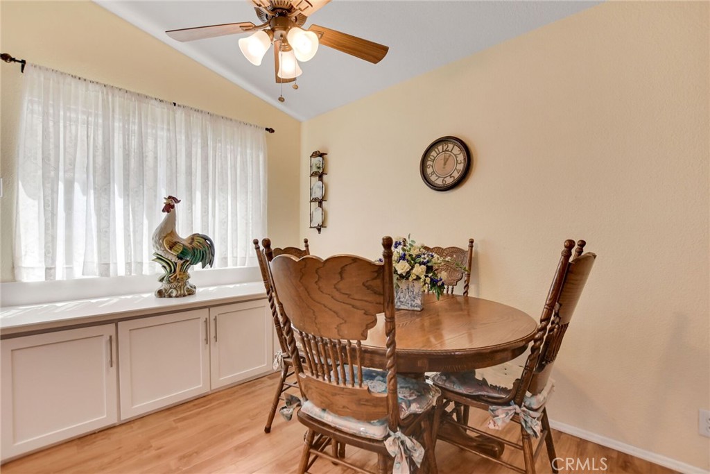 1300 Cherry Drive Hemet, CA 92545 - Photo 13 of 32 a dining room with furniture and window