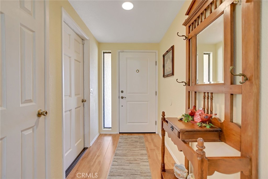 1300 Cherry Drive Hemet, CA 92545 - Photo 6 of 32 a view of a hallway to a livingroom with furniture