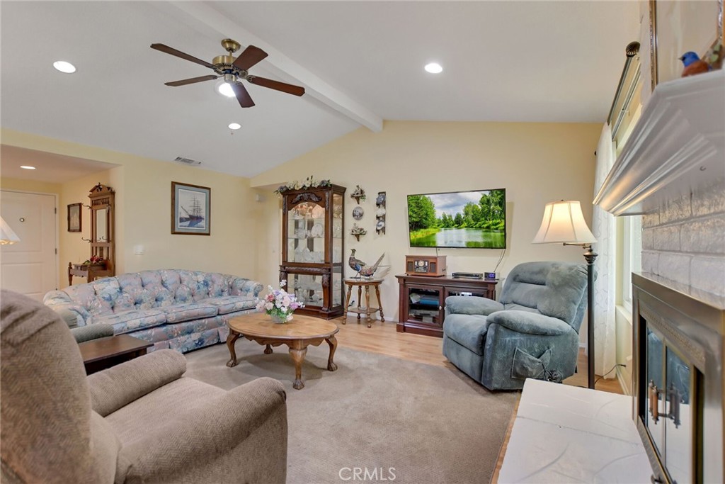 1300 Cherry Drive Hemet, CA 92545 - Photo 10 of 32 a living room with furniture and a large window