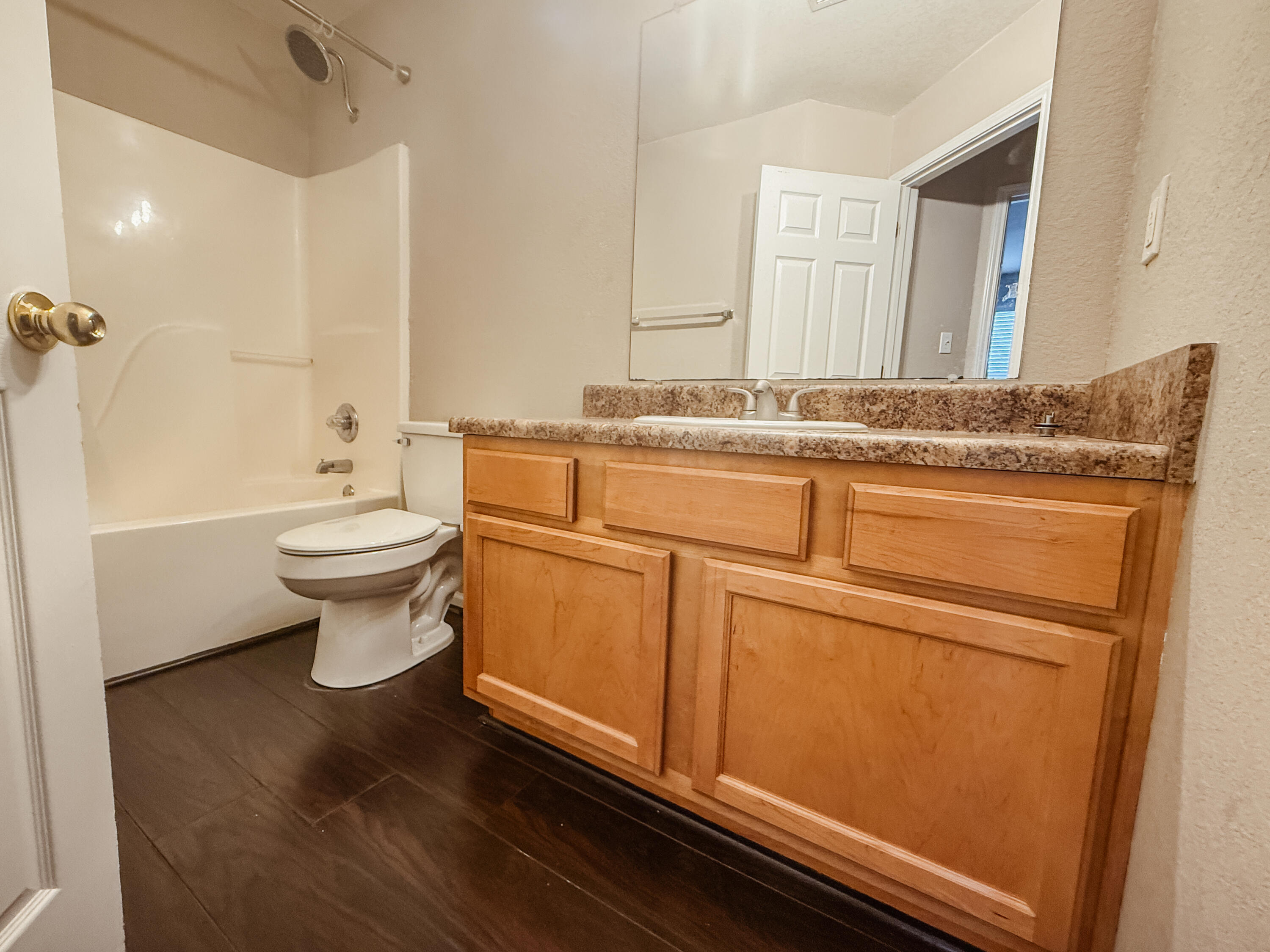 1150 Airport Road, Unit 110 Destin, FL 32541 - Photo 18 of 20 a bathroom with a sink a toilet and shower