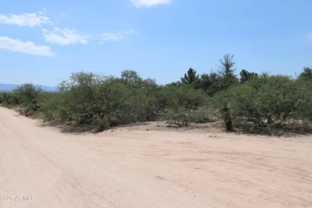 a view of street with cars