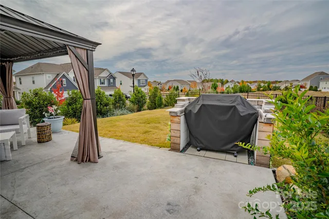 a view of a terrace with sitting area