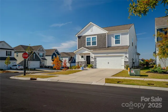 a front view of house with garage