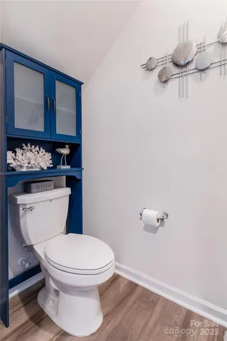a bathroom with a sink a mirror and vanity