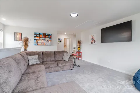 a bedroom with a bed and a cabinets