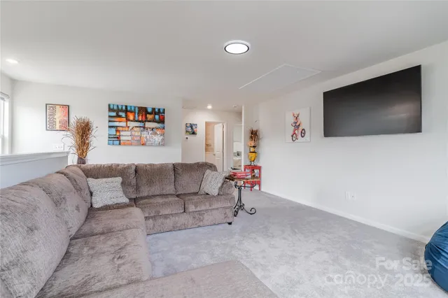a bedroom with a bed and a cabinets