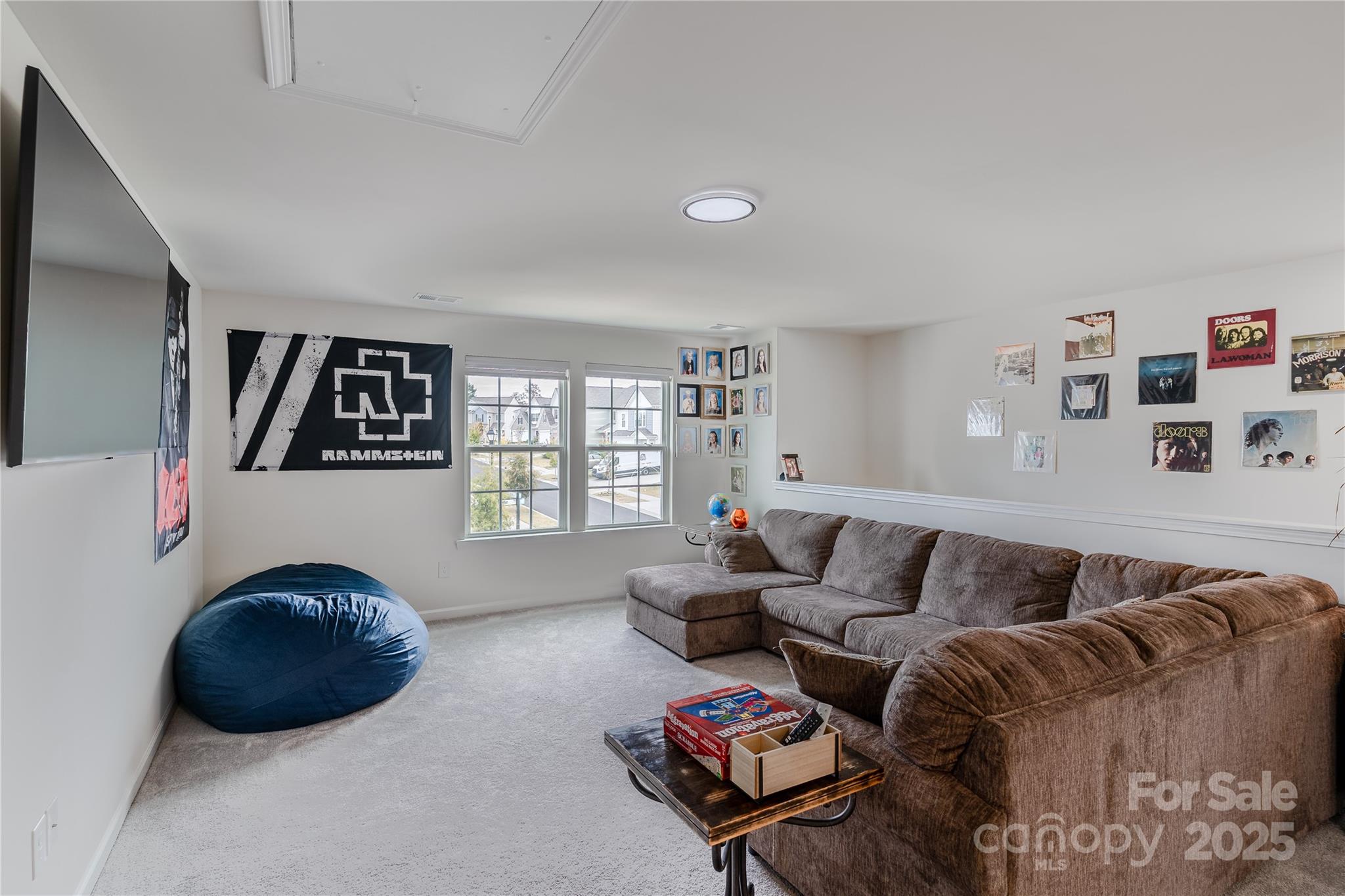 6499 Gopher Road Lancaster, SC 29720 - Photo 8 of 36 a living room with furniture a couch and a large window