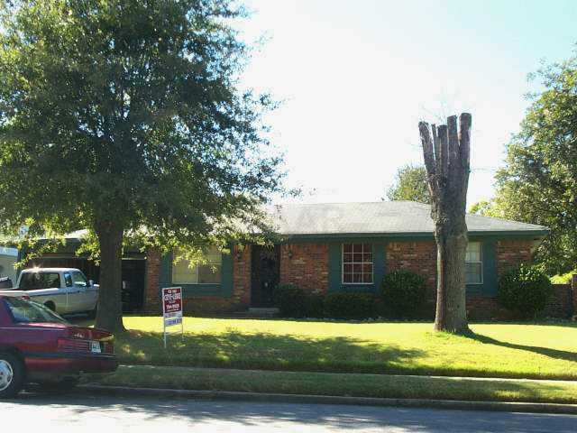 4775 Gill Road Memphis, TN 38109 - Photo 1 of 1 a front view of a house with a yard