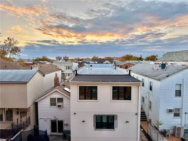 a view of a big room with many windows
