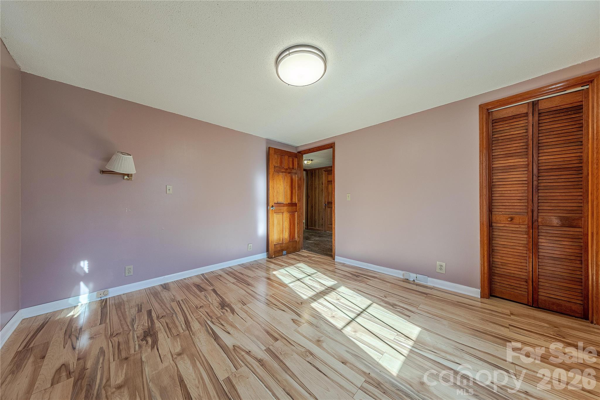 107 Valley Avenue Clover, SC 29710 - Photo 12 of 17 a view of empty room with wooden floor and fan
