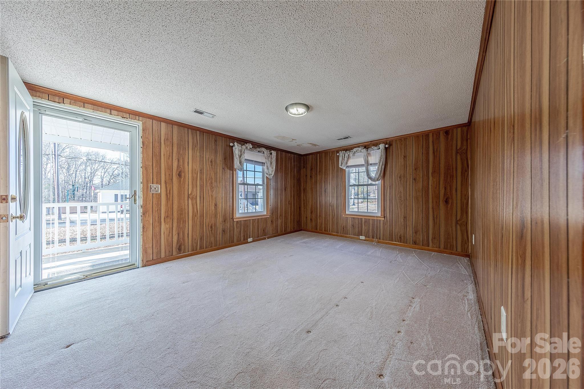 107 Valley Avenue Clover, SC 29710 - Photo 5 of 17 a view of an empty room with a window