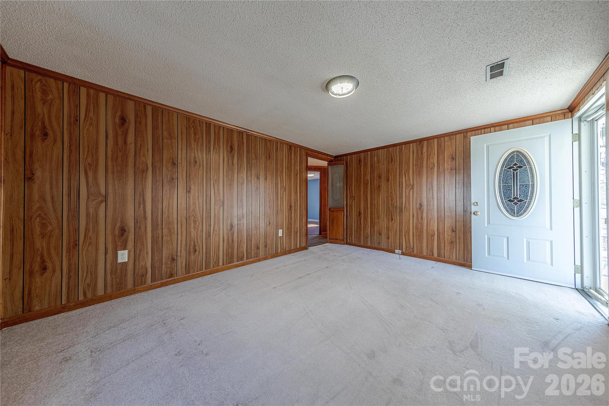 107 Valley Avenue Clover, SC 29710 - Photo 6 of 17 a view of a livingroom with wooden walls