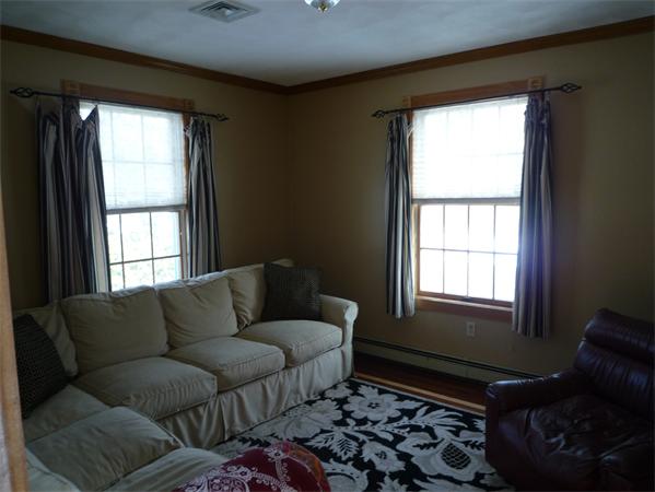 6 Stanley Road Middleton, MA 01949 - Photo 15 of 24 a living room with furniture and a window