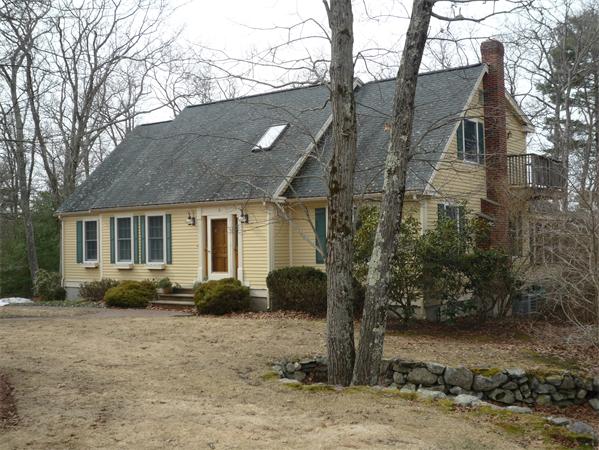 6 Stanley Road Middleton, MA 01949 - Photo 2 of 24 a front view of a house with garden